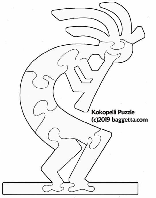 Printed scroll saw pattern beside sketchbook