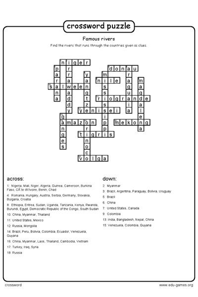 Child solving a kitchen-table crossword