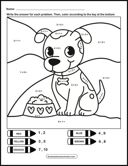 Child coloring a color-by-number addition page