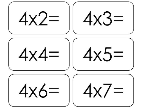 Student sorting multiplication flashcards by product values on desk