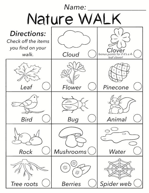 Child highlighting items on a nature scavenger list