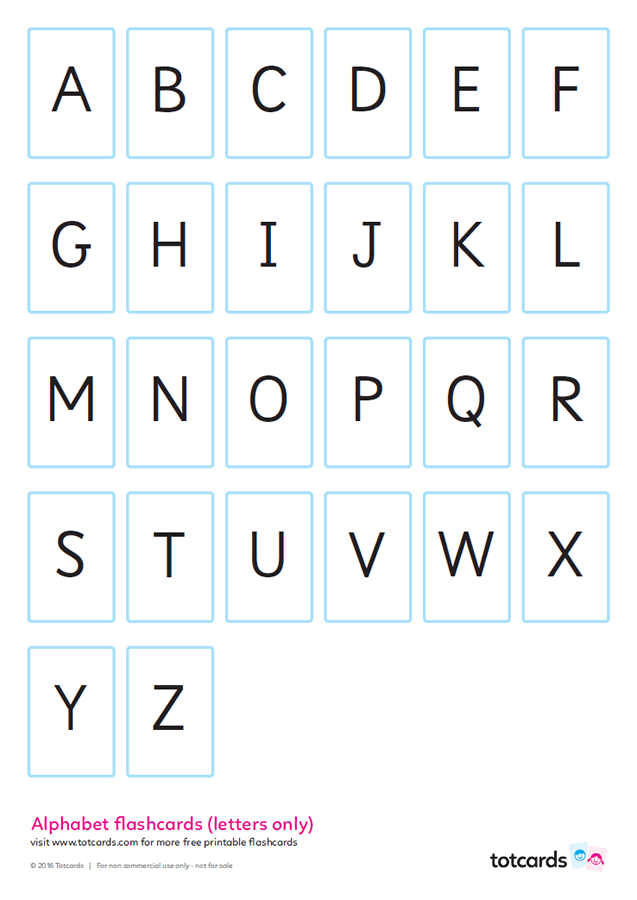 Child matching letters with colorful flashcards